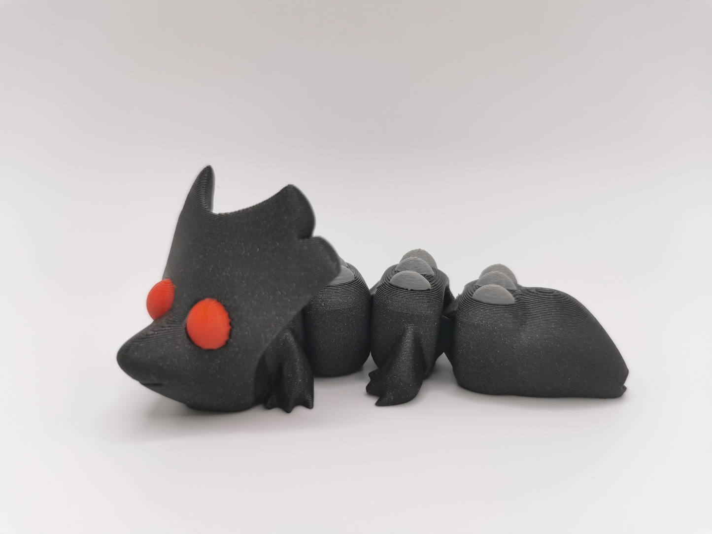 Baby Hood Dragon Flexi-Schlüsselanhänger