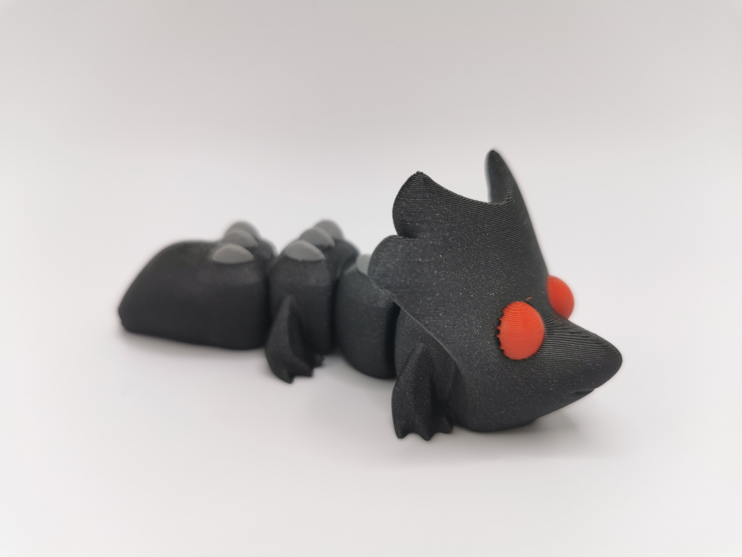 Baby Hood Dragon Flexi-Schlüsselanhänger